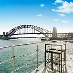 Iconic Opera House And Bridge Views