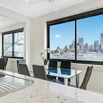 Iconic Opera House And Bridge Views